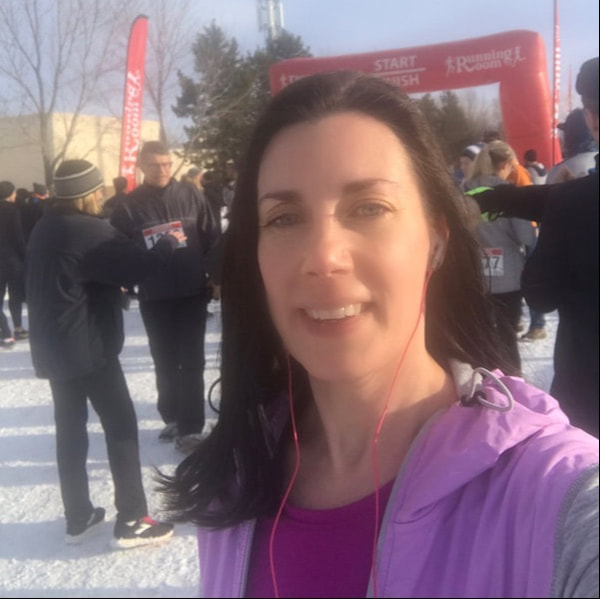 Kathy Istace at the finish line of the Resolution Run Edmonton 2019